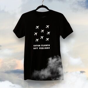 Serengetee Black T-Shirt “Catch Flights Not Feelings”